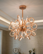 Elegant Twisted Loop Chandelier - Rose Gold