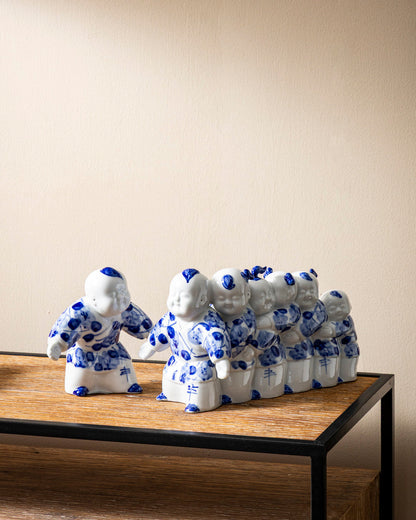 Playful Monk Parade Decorative Figurine